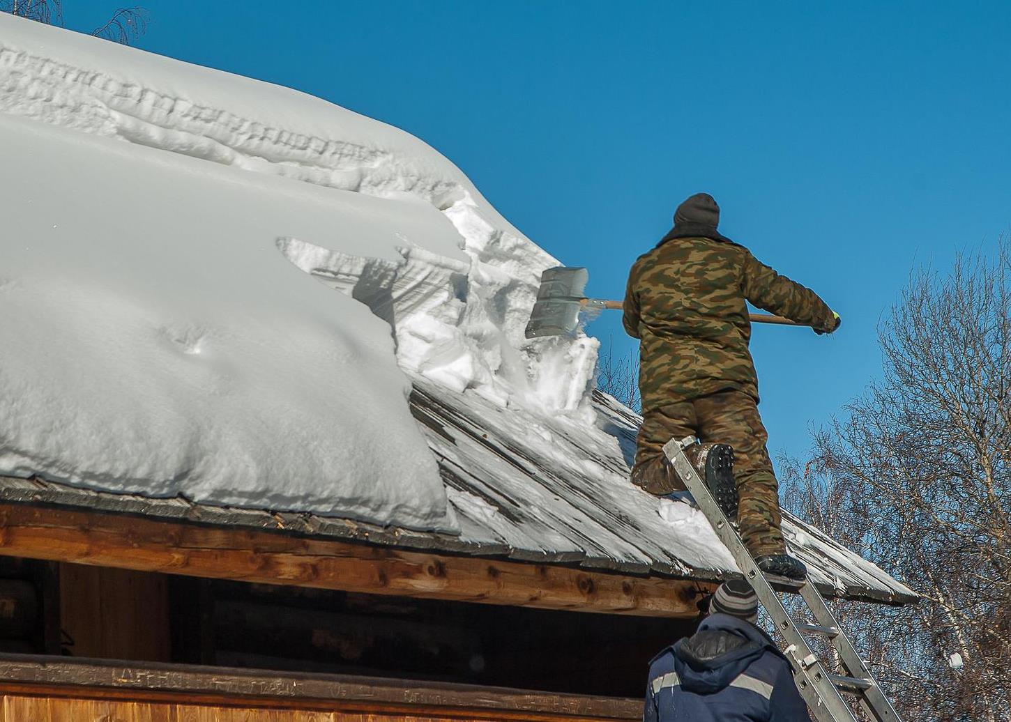 Shoveling Snow on Roof
