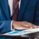 Man looking through folder