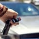 Person holding car keys