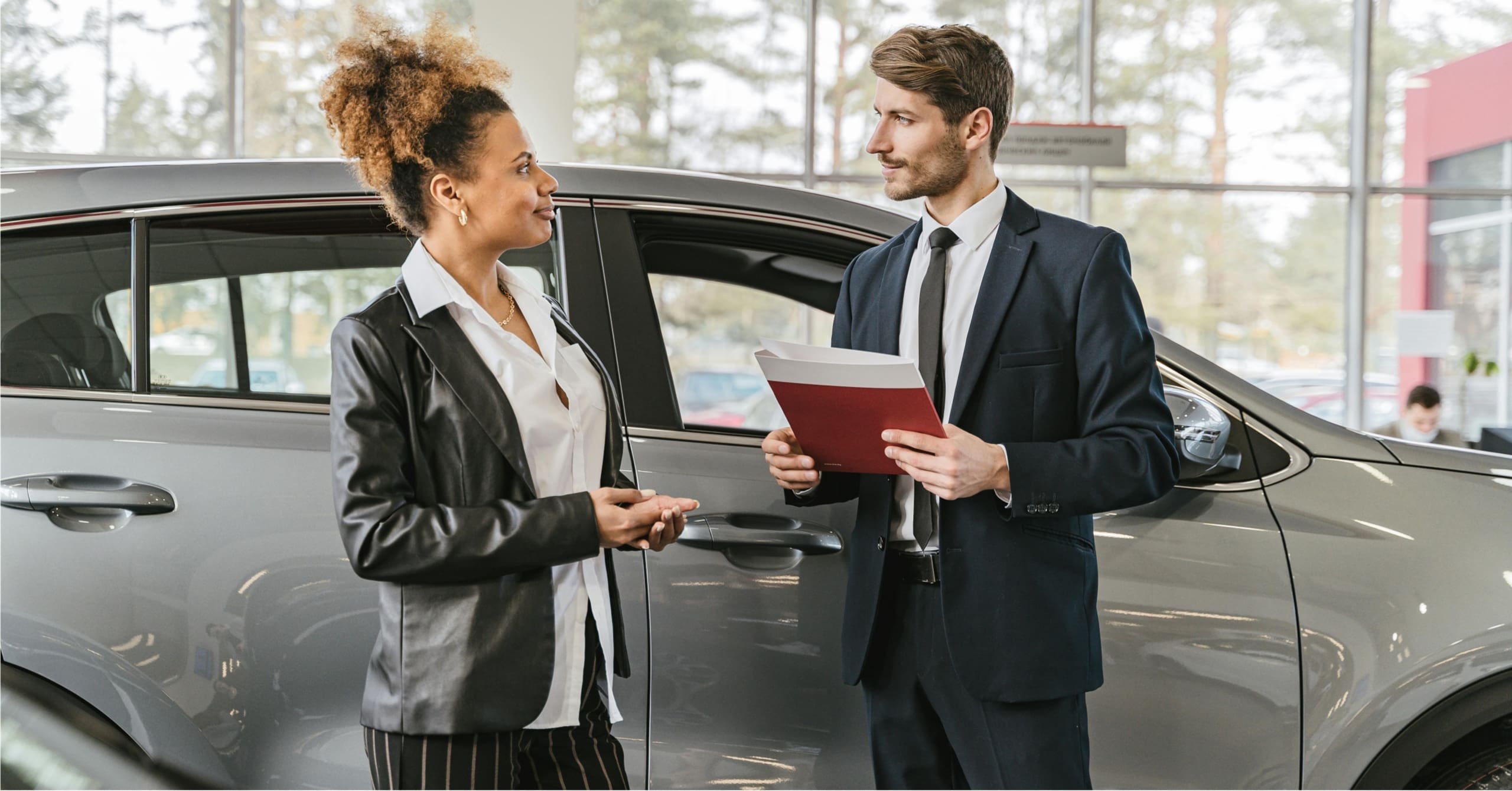 Woman buying a car